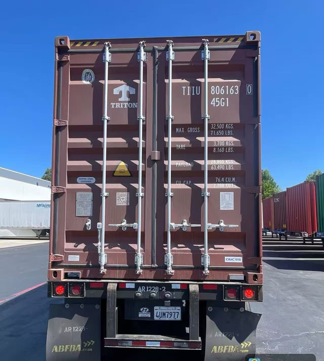 Rear doors of import container staged on chassis